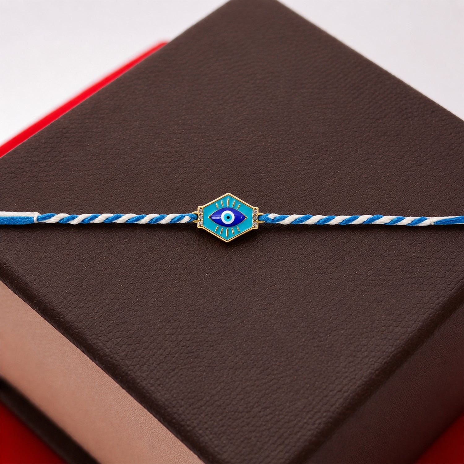 ALVENZA Evil Eye Charm Dori Rakhi – Stylish & Lightweight Gift