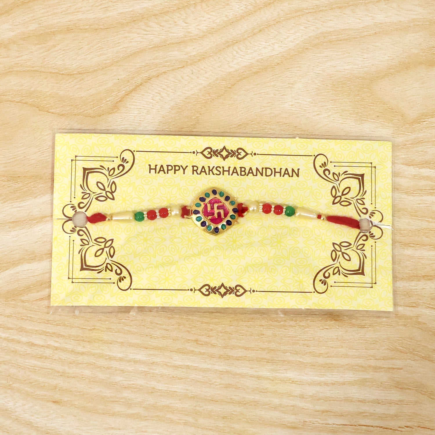 ALVENZA Auspicious Swastik Rakhi – Traditional & Stylish Beaded Design