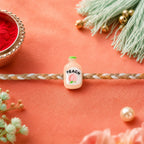 ALVENZA Peach Bottle Charm Rakhi - Elegant Festive Design for Brothers