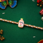 ALVENZA Peach Bottle Charm Rakhi - Elegant Festive Design for Brothers