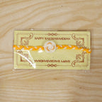 ALVENZA White Round Charm Rakhi, Stylish & Lightweight for Brothers