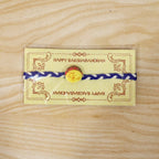 ALVENZA Yellow Sweet Dessert Dori Rakhi, Elegant & Festive Design
