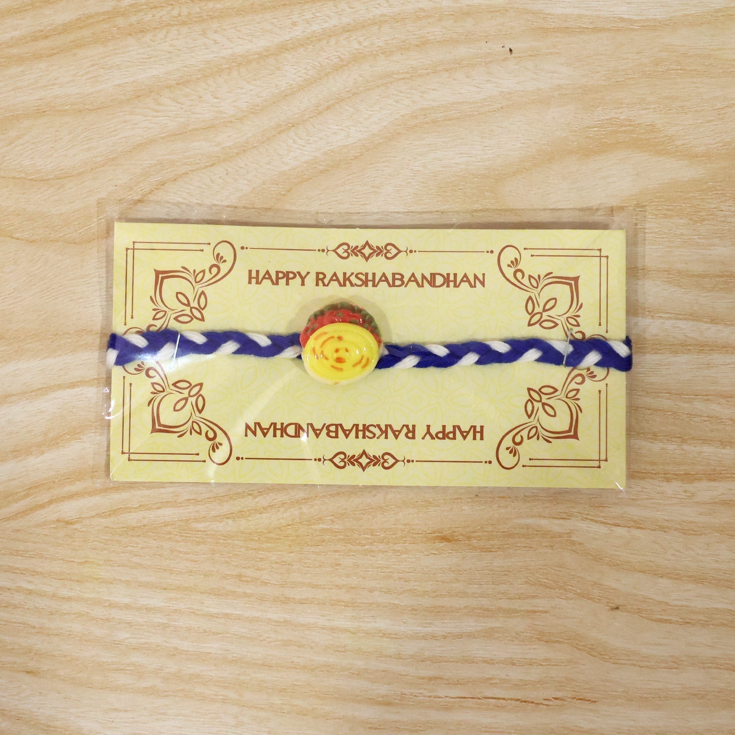 ALVENZA Yellow Sweet Dessert Dori Rakhi, Elegant & Festive Design