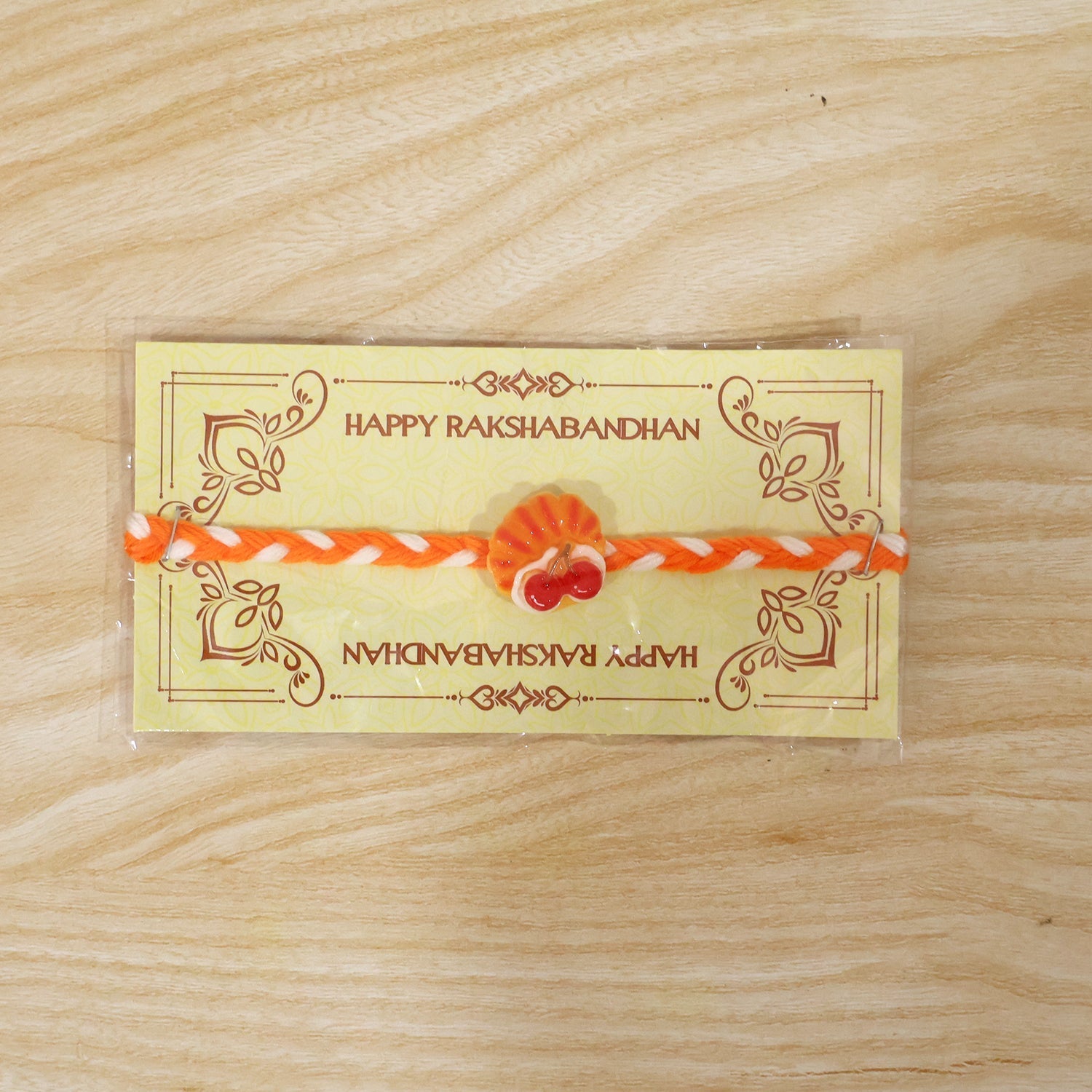 ALVENZA Rakhi for Brother - Unique Cherry Pastry Charm Design