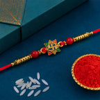 ALVENZA Golden Swastik Motif Rakhi with Enamel & Beadwork - Rakhi for Brother