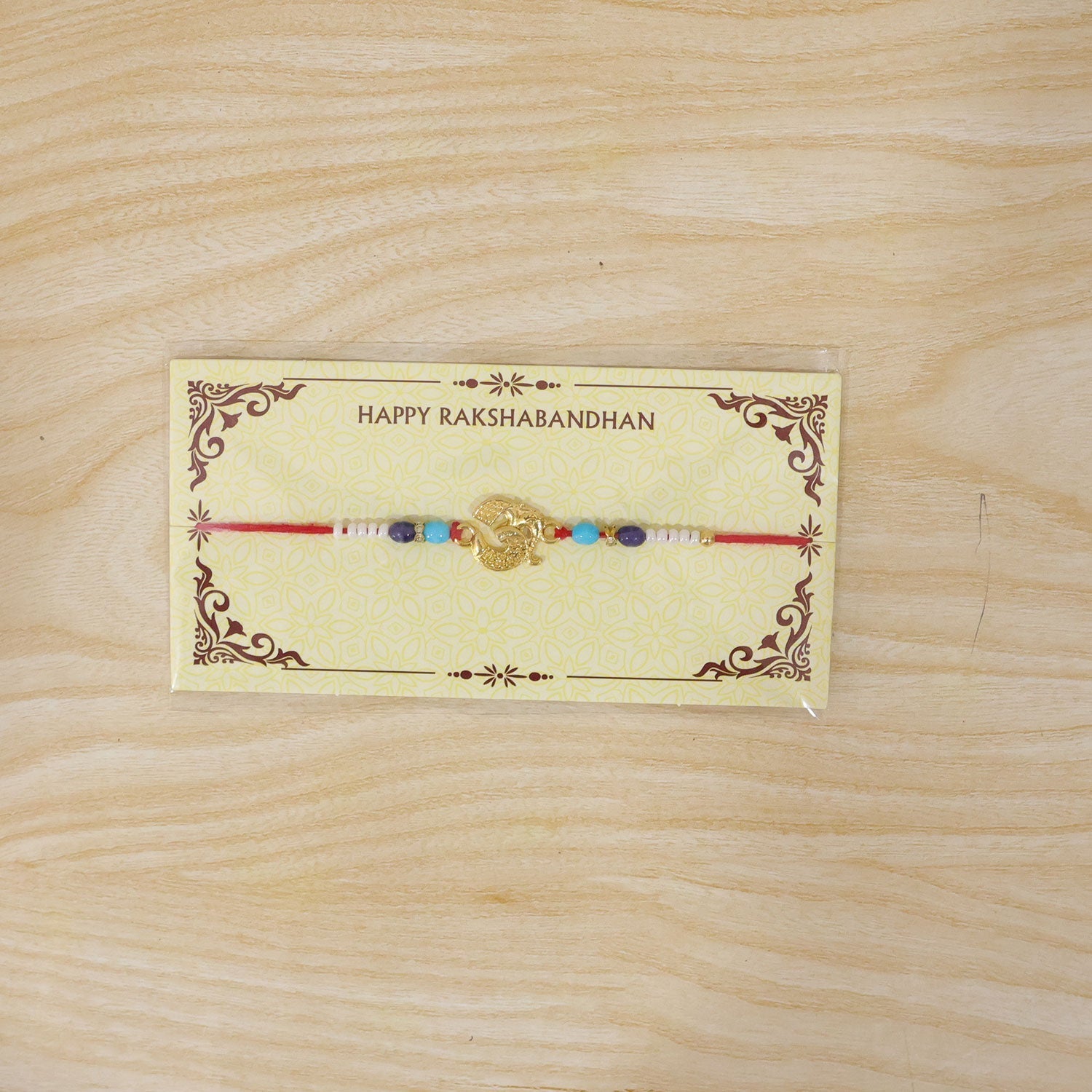 ALVENZA Om Symbol Beaded Traditional Premium Designer Rakhi for Brother