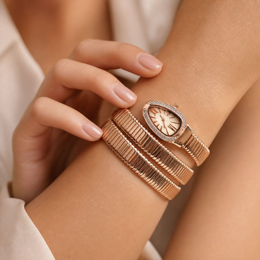 Rose Gold Oval Snake Style Bracelet Watch with Crystal Dial Border Design