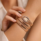 Rose Gold Oval Snake Style Bracelet Watch with Crystal Dial Border Design