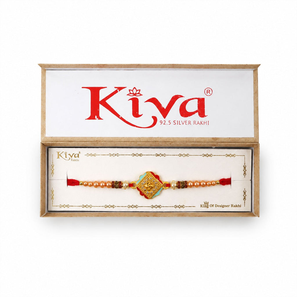 ALVENZA Golden Swastik AD Stone Rakhi with Turquoise-Red Meenakari and Pearl Beads